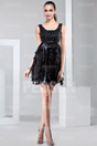 Short formal dress with ruffle skirt and sash in satin