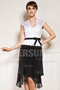 Cap sleeve knee length cocktail dress in black and white
