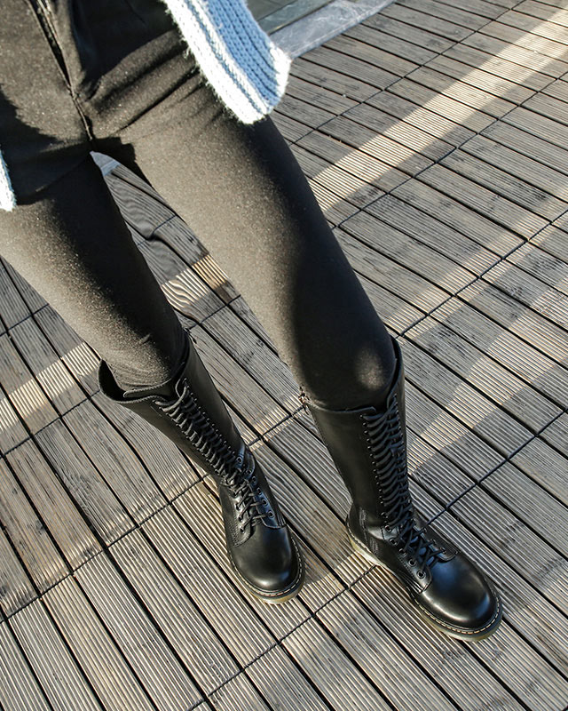 porter bottes longues avec pantalons noir