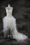 Robe de mariée fantaisie courte devant longue derrière bustier plumetis