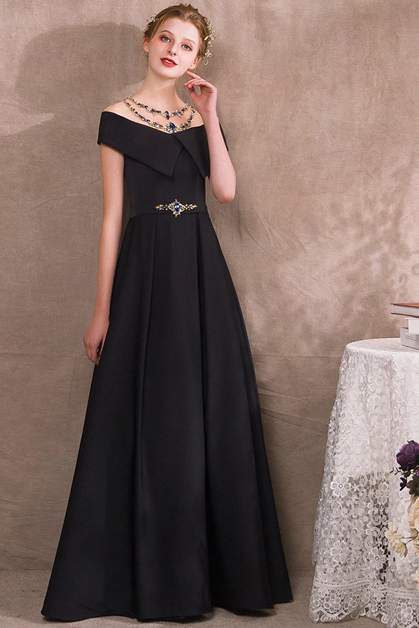 robe de soirée longue noire épaule transparente embelli de bijoux exquis