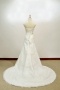 Robe mariage blanche bustier ceinturée ornée de bijoux