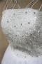 Mini robe de cocktail blanche bustier parsemé de bijoux à jupe évasée