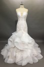 Robe de mariée vintage coupe sirène à jupe volants en organza