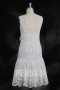 Robe de mariée courte en dentelle ivoire jupe volants