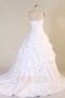 Robe de mariée princesse bustier vague en taffetas jupe bouillonnée