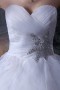 Robe princesse de mariée décolleté en cœur bustier ornée de bijoux en organza