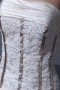 Robe de mariée bustier ornée de applique, ruché en satin