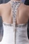 Robe de mariée princesse décolleté en cœur encolure américaine ornée de strass