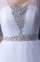Robe de mariage princesse décoleeté carré avec bretelle en tulle ornée de bijoux
