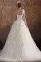 Robe de mariée moderne décolleté en cœur à une bretelle ornée de fleur