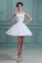 Mini robe dentelle blanche col asymétrique