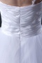 Robe de mariée princesse asymétrique ornée de fleurs