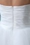 Robe de mariée bustier à jupe évasée et asymétrique