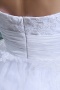 Robe de mariée bustier Empire en organza ornée de fleurs