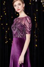 Robe soirée de luxe longue velours violette à haut embelli de bijoux