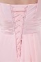 Robe de dame d'honneur rose courte asymétrique ornée de bijoux